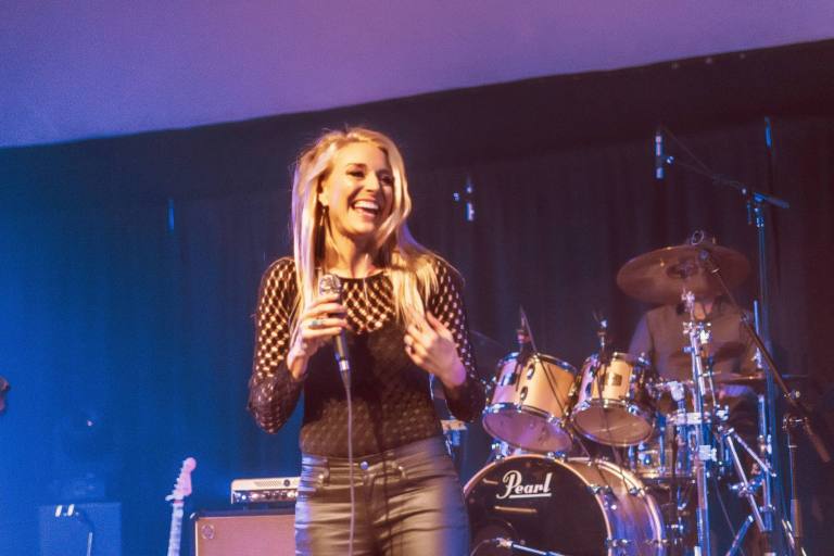 Cass smiling on stage